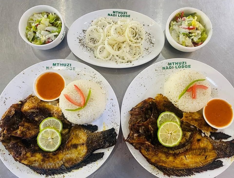 Mthuzi Nadi Lodge Delicious Local Grilled Tilapia with Rice and Salad